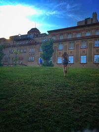 Woman walking on grass
