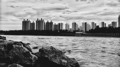 Scenic view of sea against cloudy sky