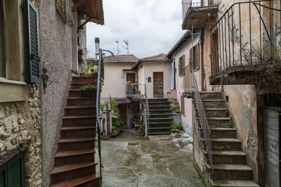 Narrow alley amidst old buildings in town