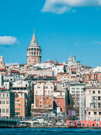 View of the galata tower through the golden horn, istanbul, turkey