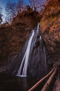 Scenic view of waterfall in forest