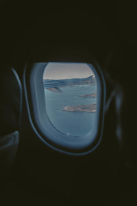 View of airplane through window