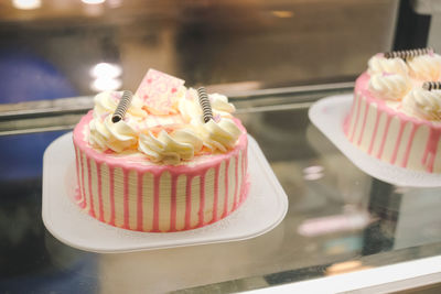 Close-up of cupcakes on cake