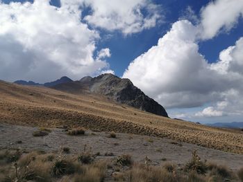 Scenic view of desert against sky