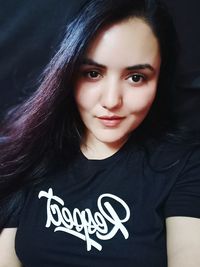 Portrait of smiling young woman