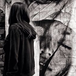 Close-up of woman standing in pond