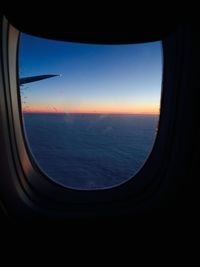 Sunset seen through airplane window