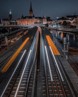 High angle view of railroad tracks at night