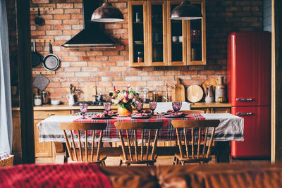 Empty chairs and tables in restaurant