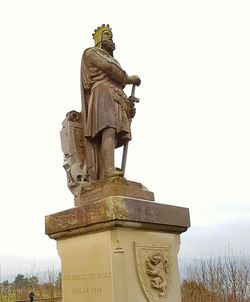 Statue against sky