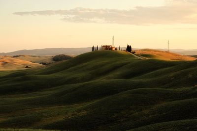 Scenic view of landscape against sky during sunset