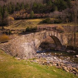 Arch bridge over river