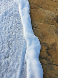 High angle view of snow covered land