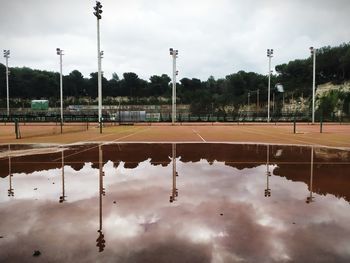 Reflection of clouds in puddle