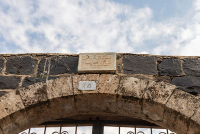 Low angle view of old building against sky