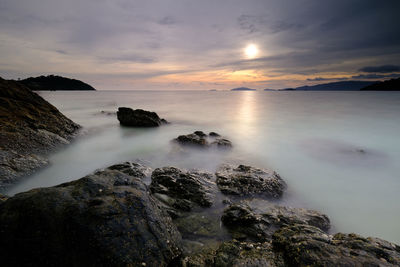 Scenic view of sea against sky during sunset