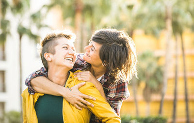 Happy lesbian couple at park