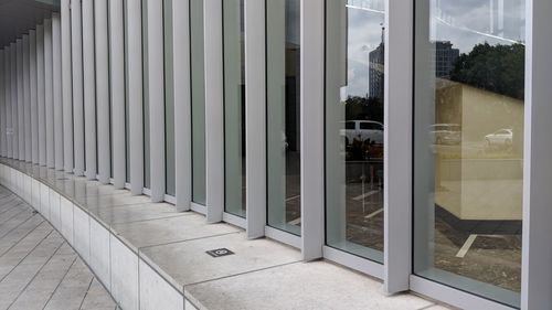 Reflection of building on glass window