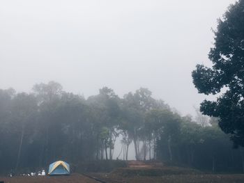 View of tent on landscape against sky