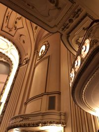 Low angle view of illuminated ceiling