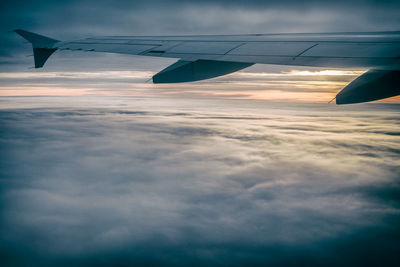 Aerial view of cloudscape over landscape against sky