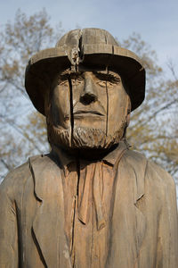 Rear view of man wearing hat against sky