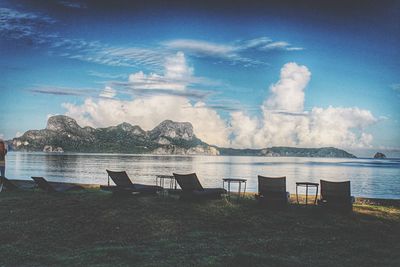 Scenic view of lake against cloudy sky