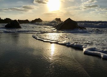 Scenic view of sea against sky during sunset