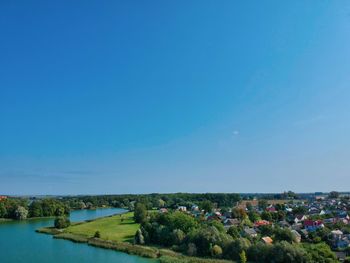 Scenic view of landscape against clear blue sky