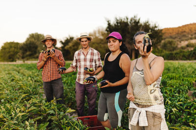 Farmers standing in farm