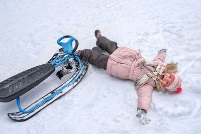 High angle view of people skiing on snow