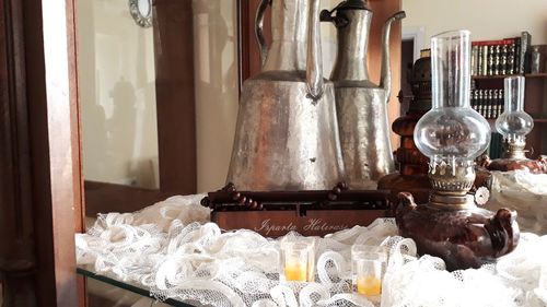 Close-up of wine glass on table at home