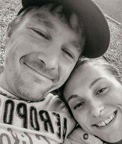 Close-up portrait of a smiling young couple