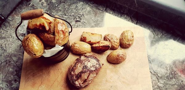 High angle view of bread on cutting board
