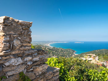 Scenic view of sea against blue sky