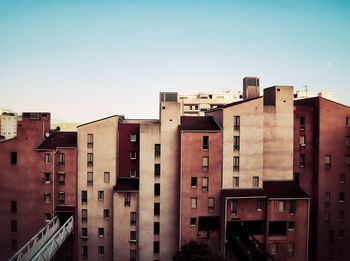 Low angle view of buildings against clear sky