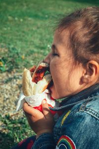 Close-up of man eating food