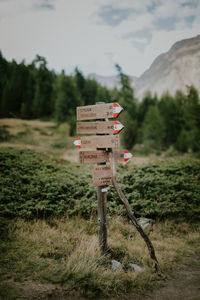 Information sign surrounded by mountains