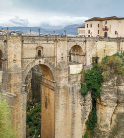 Puente nuevo is bridge that span the 120-metre deep chasm that divides the city of ronda, spain