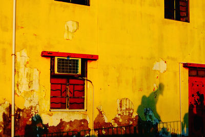 Close-up of yellow building