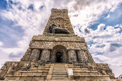 Low angle view of historical building shipka in bulgaria against sky