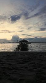 Scenic view of sea against sky at sunset