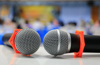 Close-up of microphone on table