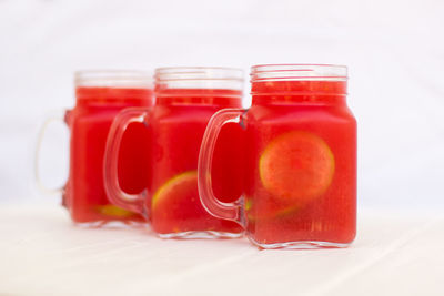 Close-up of drink in glass jar on table