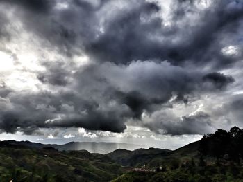 Storm clouds over landscape