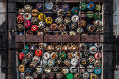 Full frame shot of colorful spray paint cans