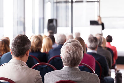 Rear view of people in seminar