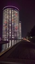 Low angle view of illuminated building at night