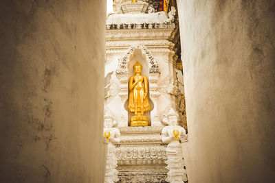 Statue of historic building at temple