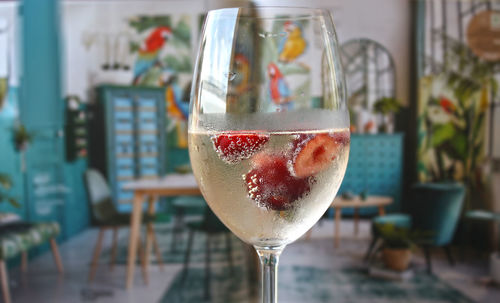 Close-up of fruit in wineglass